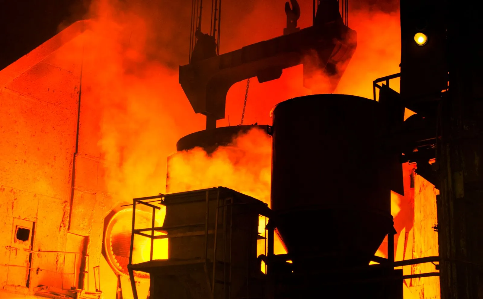 Molten steel processing at an industrial steel plant